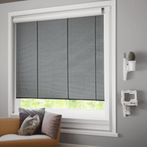 Blackout blind is installed in the living room window